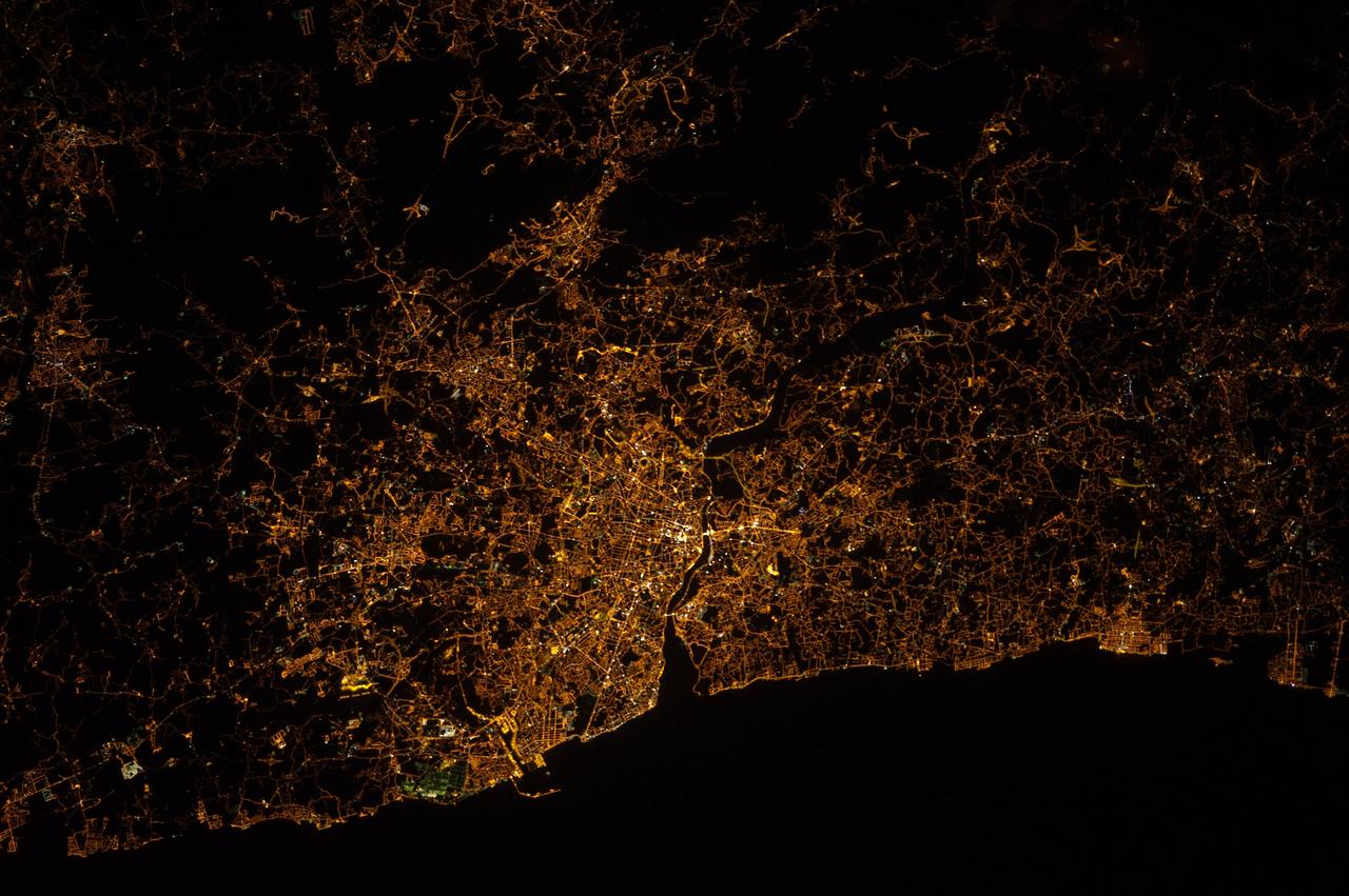 ISS032-E-015055 (5 Aug. 2012) --- One of the Expedition 32 crew members aboard the International Space Station recorded this nighttime image of Portugal featuring Porto (left) and Vila Nova de Gaia (right) astride the Douro River on the northwestern coast.  For orientation purposes, the top is almost due east.