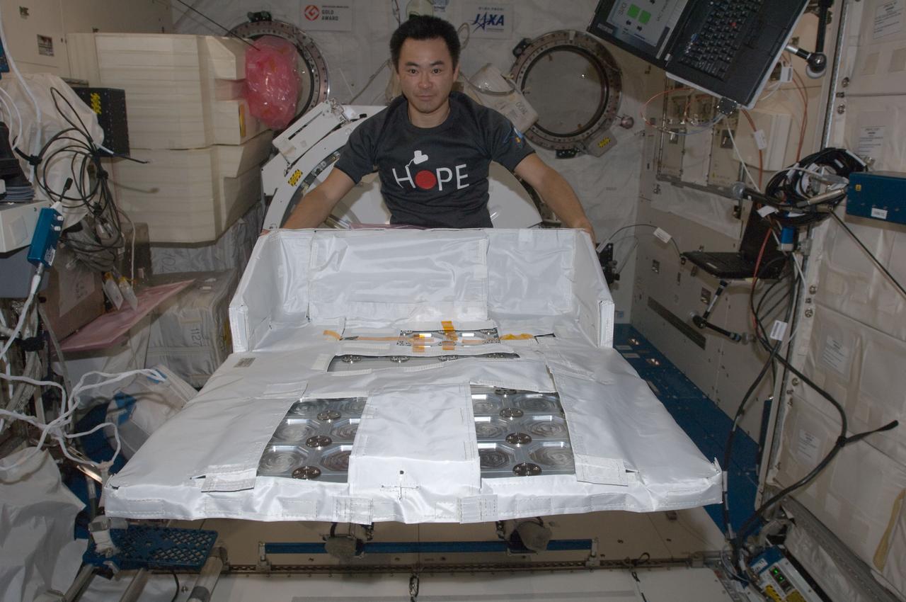 ISS032-E-022180 (21 Aug. 2012) --- Japan Aerospace Exploration Agency astronaut Aki Hoshide, Expedition 32 flight engineer, assembles the JEM Robotic Maneuvering System Multi-Purpose Experiment Platform (JEMRMS MPEP) in the Kibo laboratory of the International Space Station.