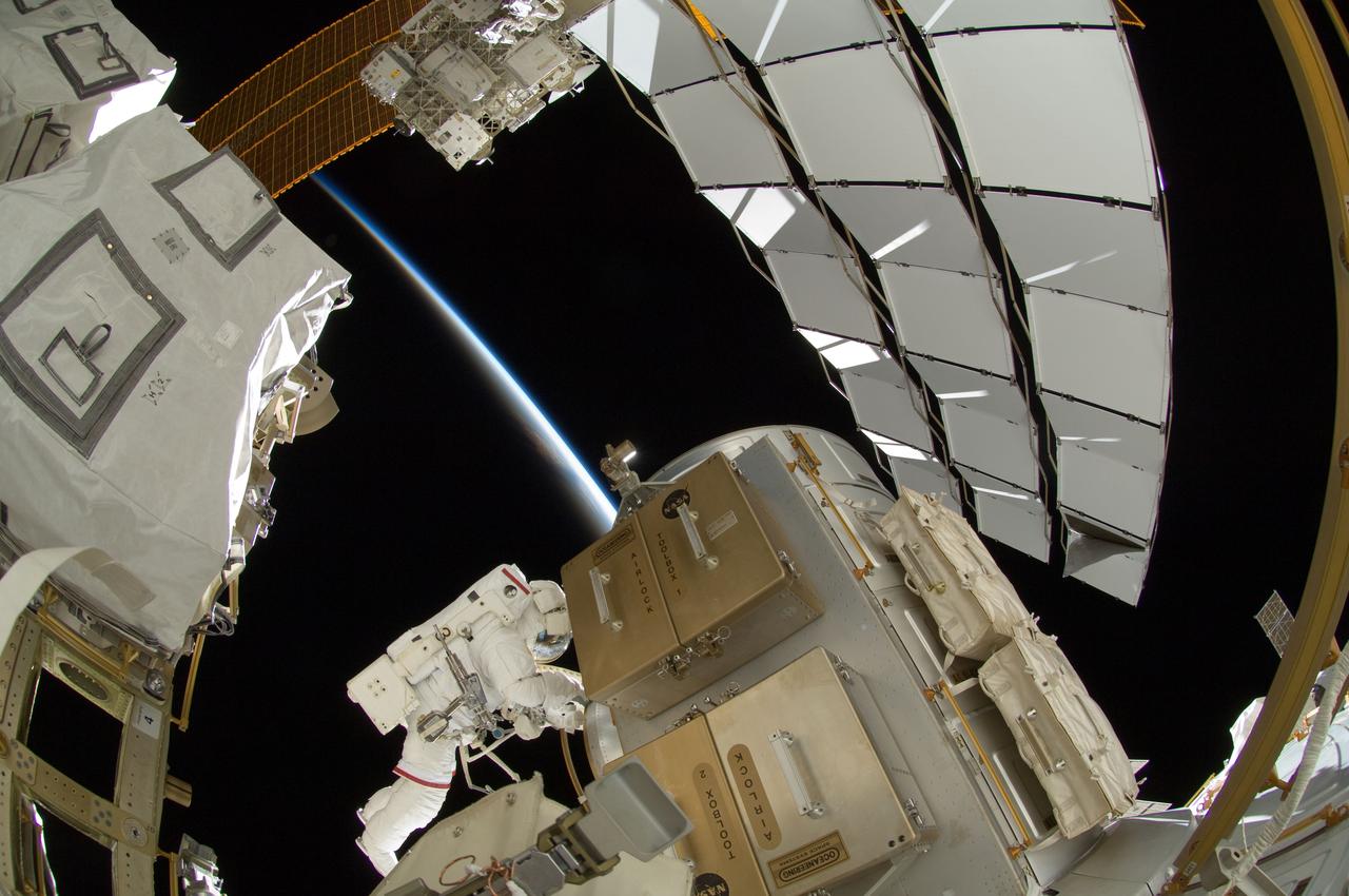 ISS032-E-025280 (5 Sept. 2012) --- NASA astronaut Sunita Williams, Expedition 32 flight engineer, participates in the mission?s third session of extravehicular activity (EVA). During the six-hour, 28-minute spacewalk, Williams and Japan Aerospace Exploration Agency astronaut Aki Hoshide (out of frame), flight engineer, completed the installation of a Main Bus Switching Unit (MBSU) that was hampered last week by a possible misalignment and damaged threads where a bolt must be placed. They also installed a camera on the International Space Station?s robotic arm, Canadarm2. The thin blue line of Earth?s atmosphere and the blackness of space provide the backdrop for the scene.