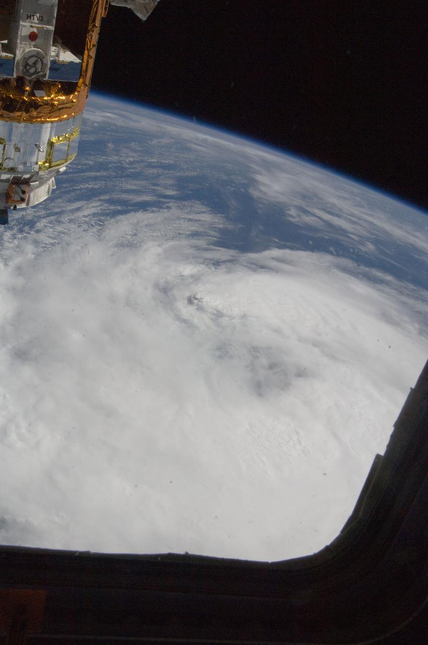 ISS032-E-025603 (9 Sept. 2012) --- Tropical Storm Leslie is clearly seen in the Atlantic Ocean on Sept. 9, 2012, as photographed by one of the Expedition 32 crew members aboard the Cupola of the International Space Station. At the time of the photo, Leslie was centered near 33.4 degrees north latitude and 62.1 degrees west longitude (approximately 175 miles east-northeast of Bermuda) moving northward at 14 miles per hour with winds of 60 miles per hour. The HTV-3 (H-II Transfer Vehicle) of the Japan Aerospace Exploration Agency (JAXA), which will be disconnected from the orbital outpost and sent to fall into Earth's atmosphere after fully completing its mission, is in the upper left corner.