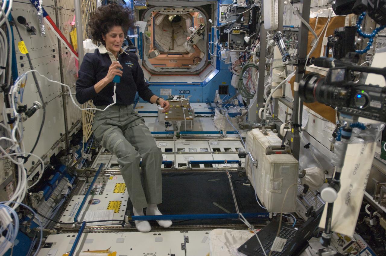 ISS033-E-013382 (19 Oct. 2012) --- NASA astronaut Sunita Williams, Expedition 33 commander, talks on a microphone in the Destiny laboratory of the International Space Station.