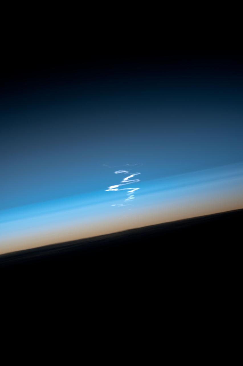 ISS033-E-015386 (23 Oct. 2012) --- This view of Earth’s horizon, shows smoke trails from the launch of the Soyuz TMA-06M spacecraft, was photographed by an Expedition 33 crew member on the International Space Station. The Soyuz, with Expedition 33 crew members Soyuz Commander Oleg Novitskiy, Flight Engineer Kevin Ford of NASA, and Flight Engineer Evgeny Tarelkin of Roscosmos onboard, launched at 4:51 p.m. Kazakhstan time (5:51 a.m. CDT) on Oct. 23, 2012, from Baikonur, Kazakhstan.