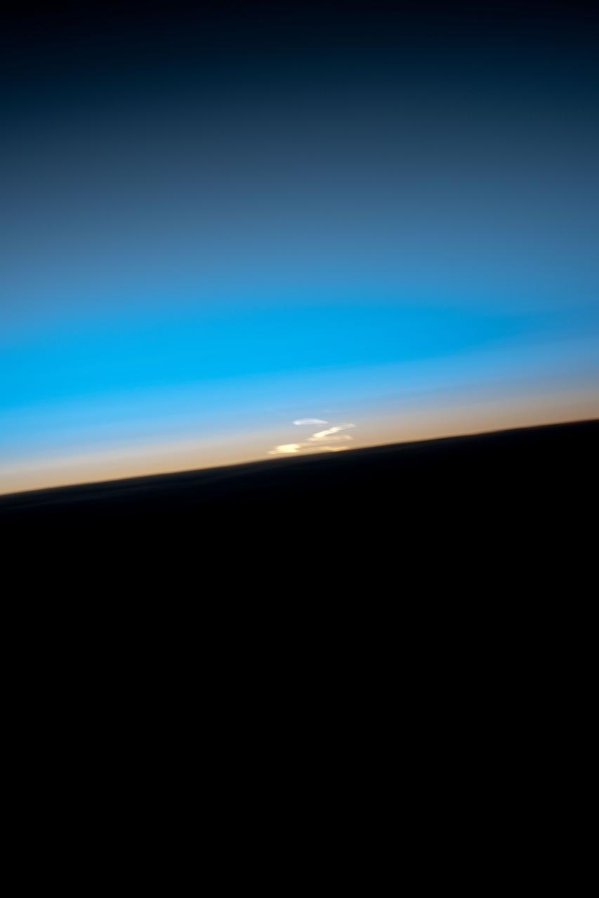 ISS033-E-015394 (23 Oct. 2012) --- This view of Earth’s horizon, shows smoke trails from the launch of the Soyuz TMA-06M spacecraft, was photographed by an Expedition 33 crew member on the International Space Station. The Soyuz, with Expedition 33 crew members Soyuz Commander Oleg Novitskiy, Flight Engineer Kevin Ford of NASA, and Flight Engineer Evgeny Tarelkin of Roscosmos onboard, launched at 4:51 p.m. Kazakhstan time (5:51 a.m. CDT) on Oct. 23, 2012, from Baikonur, Kazakhstan.