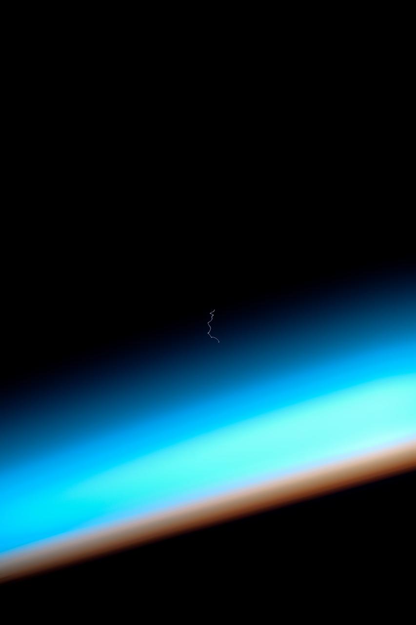 ISS033-E-015399 (23 Oct. 2012) --- This view of Earth’s horizon, shows smoke trails from the launch of the Soyuz TMA-06M spacecraft, was photographed by an Expedition 33 crew member on the International Space Station. The Soyuz, with Expedition 33 crew members Soyuz Commander Oleg Novitskiy, Flight Engineer Kevin Ford of NASA, and Flight Engineer Evgeny Tarelkin of Roscosmos onboard, launched at 4:51 p.m. Kazakhstan time (5:51 a.m. CDT) on Oct. 23, 2012, from Baikonur, Kazakhstan.