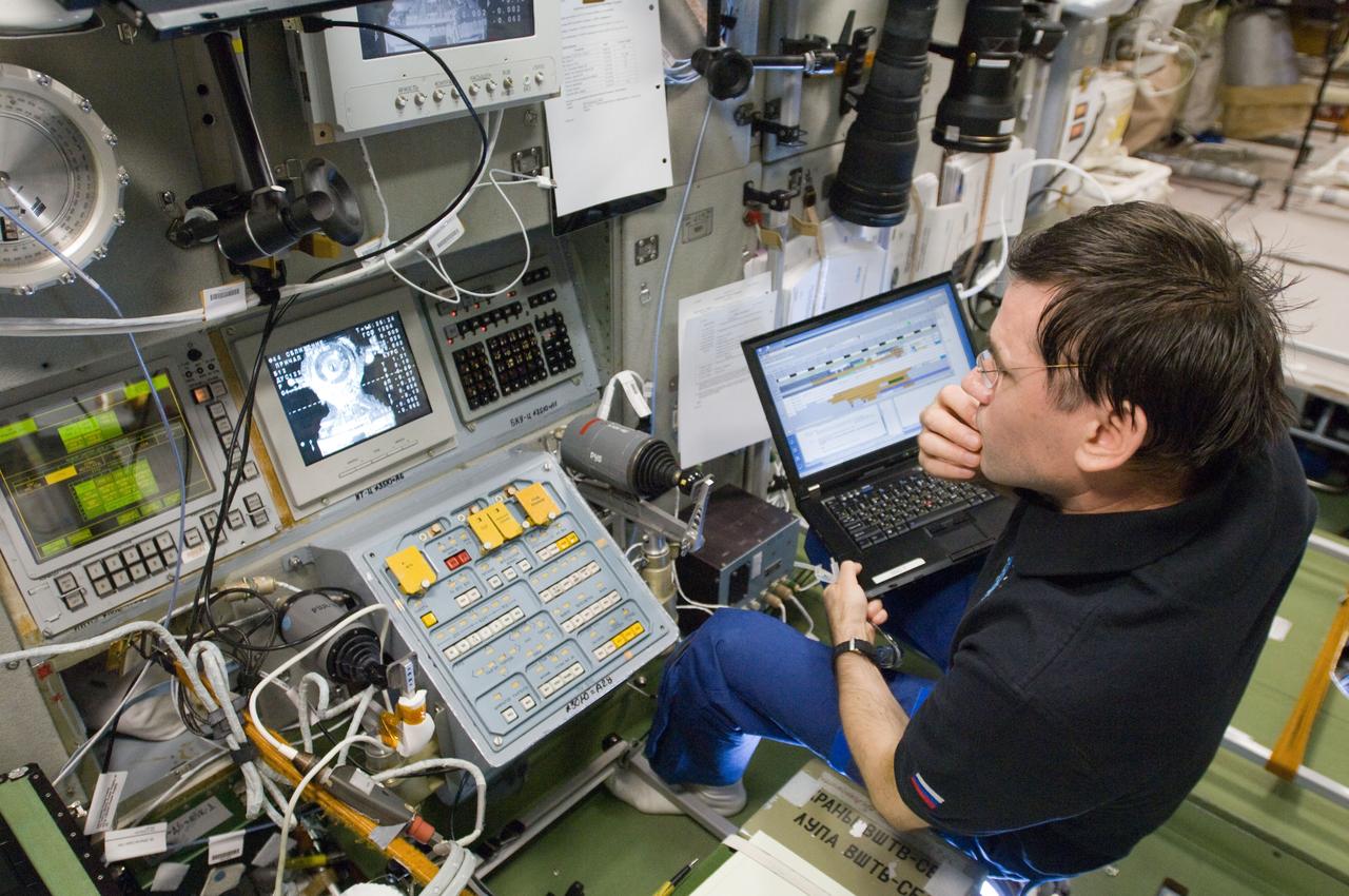 ISS033-E-016098 (25 Oct. 2012) --- In the Zvezda Service Module, Russian cosmonaut Yuri Malenchenko, Expedition 33 flight engineer, monitors the rendezvous and docking of the Soyuz TMA-06M spacecraft, bringing NASA astronaut Kevin Ford, Russian cosmonauts Oleg Novitskiy and Evgeny Tarelkin to the space station.
