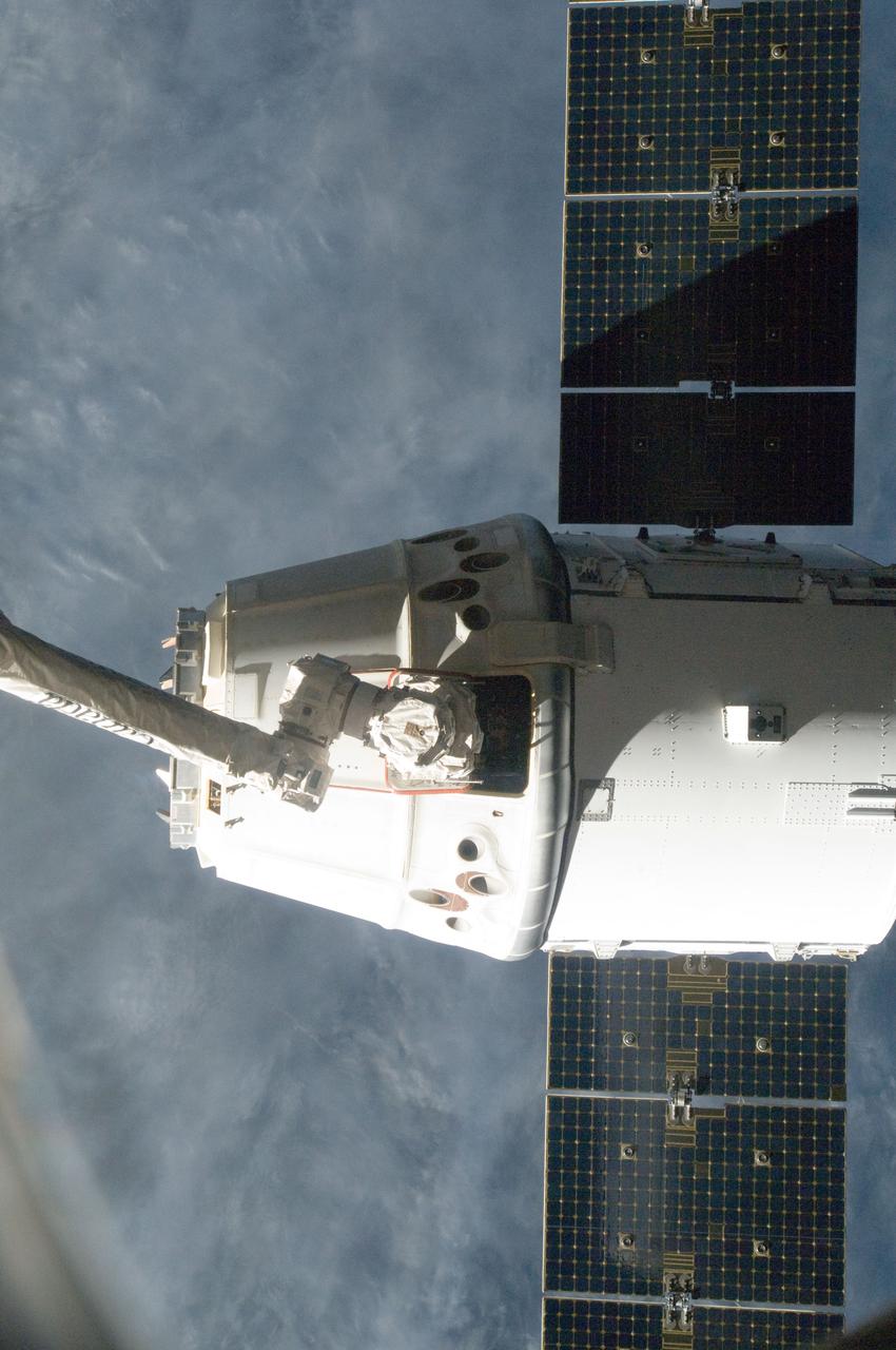 ISS033-E-016526 (28 Oct. 2012) --- The SpaceX Dragon commercial cargo craft is pictured just prior to being released by the International Space Station's Canadarm2 robotic arm on Oct. 28 to allow it to head toward a splashdown in the Pacific Ocean.