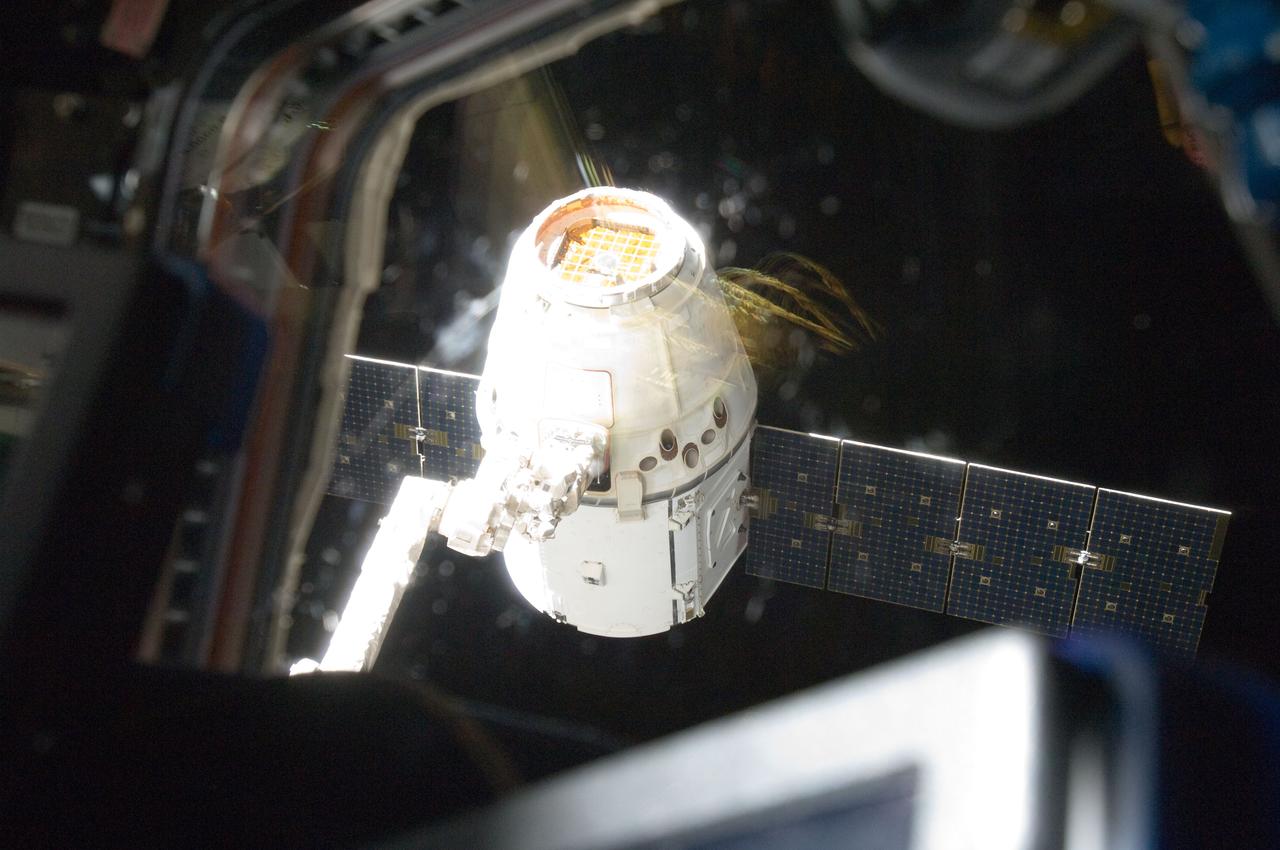 ISS033-E-016529 (28 Oct. 2012) --- The SpaceX Dragon commercial cargo craft is pictured just prior to being released by the International Space Station's Canadarm2 robotic arm on Oct. 28 to allow it to head toward a splashdown in the Pacific Ocean.