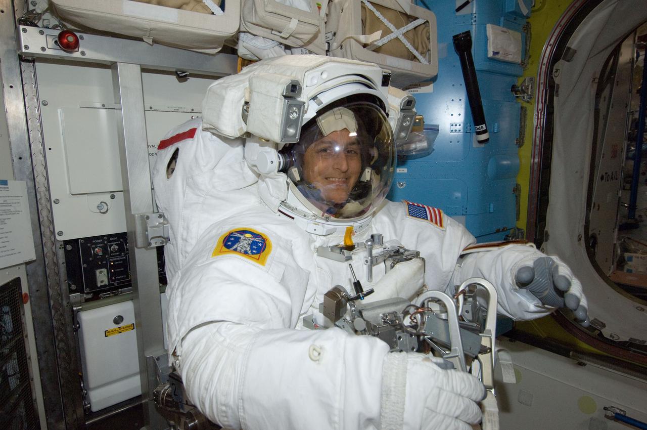 ISS033-E-018404 (1 Nov. 2012) --- NASA astronaut Sunita Williams, Expedition 33 commander, is pictured in the Quest airlock of the International Space Station as she prepares for the start of a session of extravehicular activity (EVA) outside the International Space Station on Nov. 1, 2012. Williams is wearing an Extravehicular Mobility Unit (EMU) spacesuit.