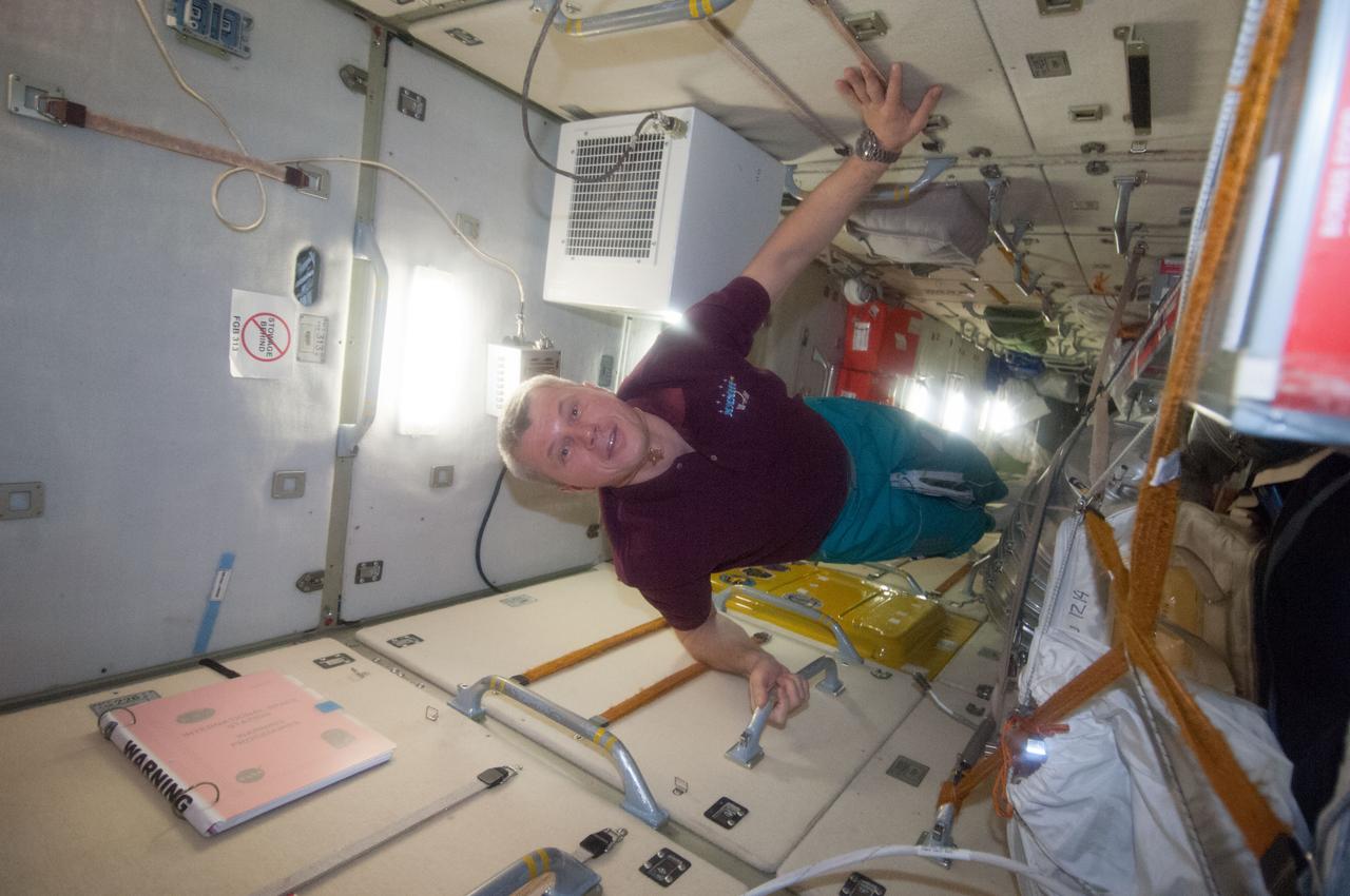 ISS033-E-022199 (17 Nov. 2012) --- Russian cosmonaut Oleg Novitskiy, Expedition 34 flight engineer, is pictured in the Zarya Functional Cargo Block (FGB) of the International Space Station following closing of hatches between the Soyuz 31 (TMA-05M) and the station as the three Expedition 33 crew members prepare to undock from the station.