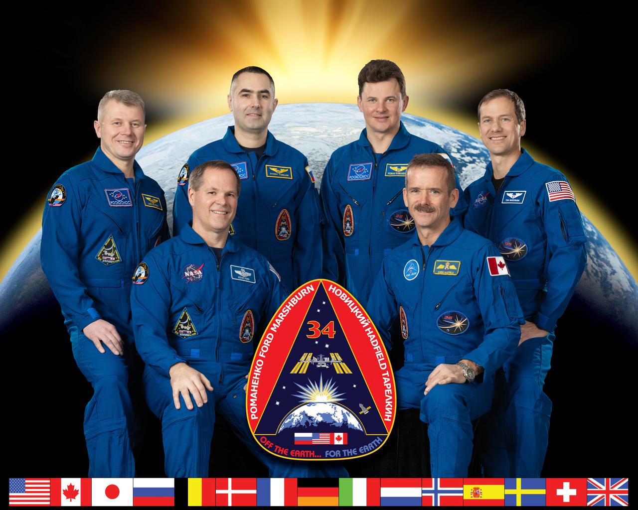 Expedition 33/34 official crew portrait. (Soyuz 32S & 33S).  Expedition 33: Kevin Ford, Oleg Novitskiy, Evgeny Tarelkin.  Expedition 34: Chris Hadfield (CSA), Tom Marshburn and Roman Romanenko.  Photo Date: January 19, 2012.  Location: Building 8, Room 183 - Photo Studio.  Photographer: Robert Markowitz