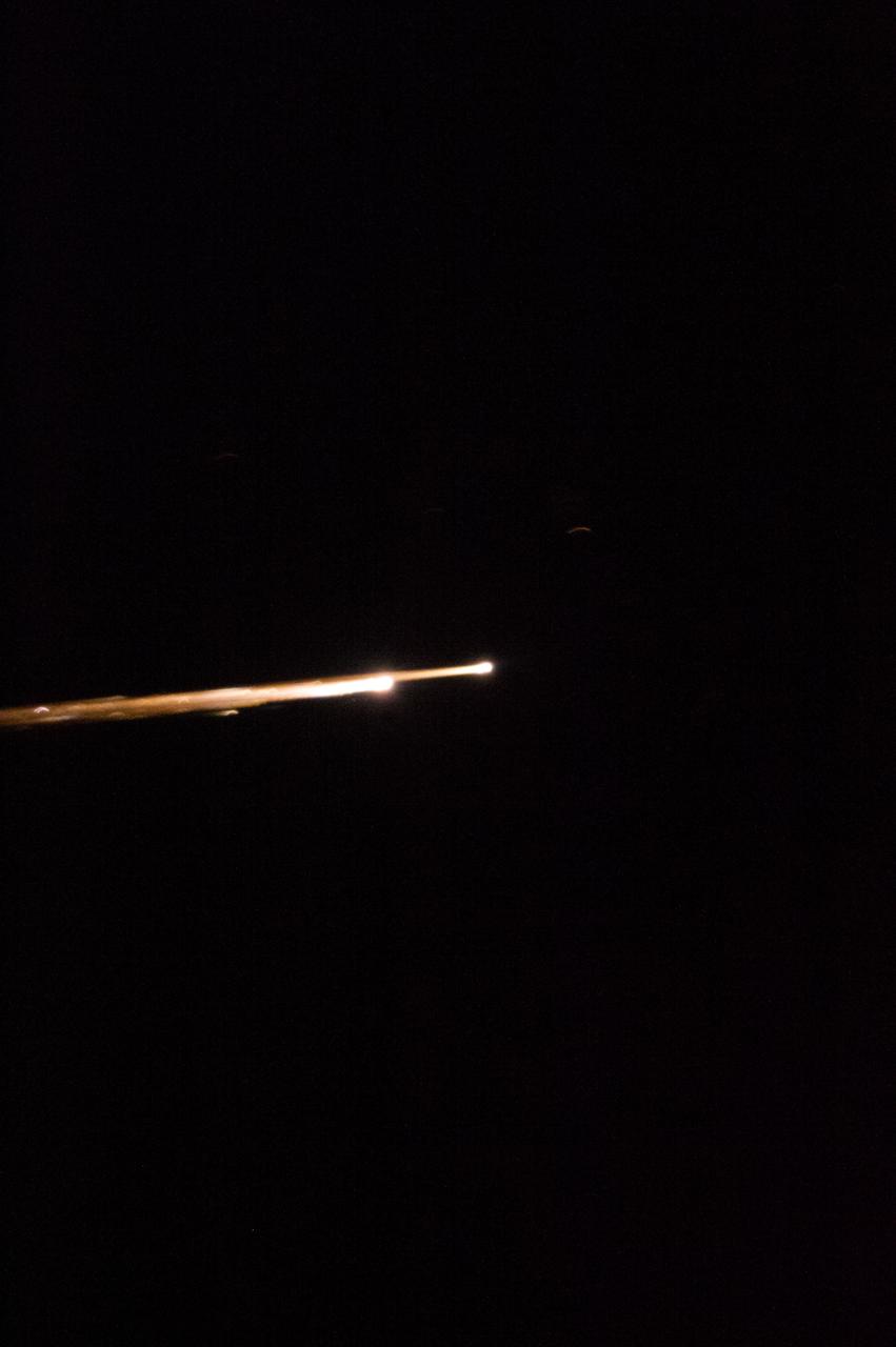 ISS034-E-005034 (18 Nov. 2012) --- Soyuz TMA-05M (descent module) beginning to re-enter the Earth's atmosphere on Nov. 19 (real time, Nov. 18, U.S. time) leaving a plasma trail as the Expedition 33 crew streaked toward a pre-dawn landing on the steppe of Kazakhstan northeast of Arkalyk.