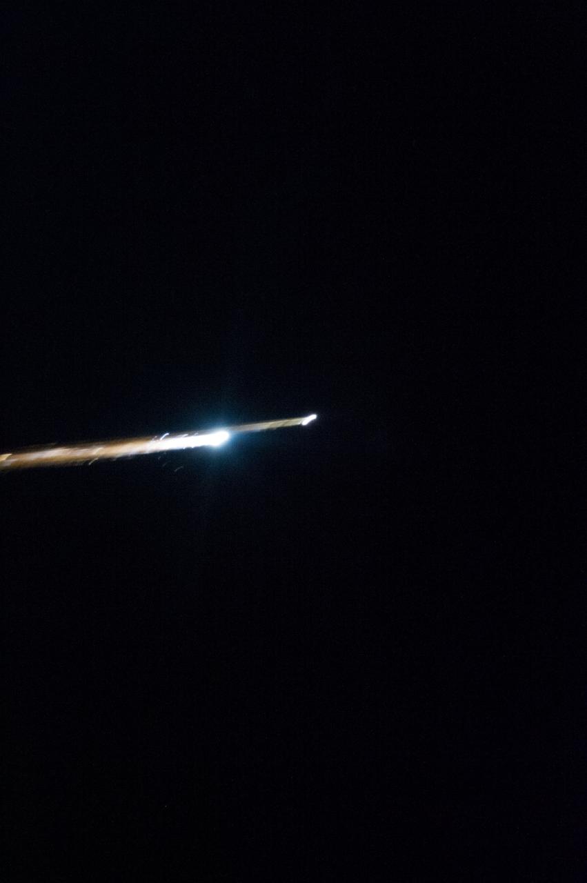 ISS034-E-005037 (18 Nov. 2012) --- Soyuz TMA-05M (descent module) beginning to re-enter the Earth's atmosphere on Nov. 19 (real time, Nov. 18, U.S. time) leaving a plasma trail as the Expedition 33 crew streaked toward a pre-dawn landing on the steppe of Kazakhstan northeast of Arkalyk.