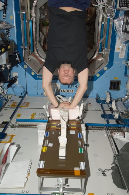 NASA image: Novitskiy participates in a CHeCS medical contingency drill in the U.S. Laboratory