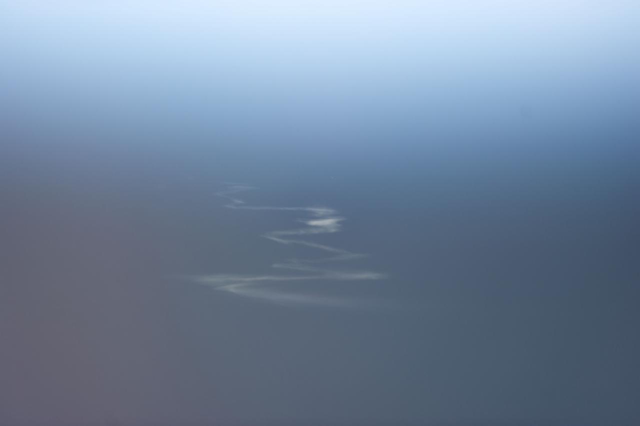 ISS034-E-009486 (19 Dec. 2012) --- Though somewhat faint, the contrails from the launch of the Expedition 34/35 crew onboard the Soyuz TMA-07M on Dec. 19 are recognizable  while the International Space Station and its three-man Expedition 34 crew were over the Caspian Sea. The skies were clear over the Baikonur Cosmodrome at this time, making it possible that these contrail "clouds" would be easy to spot.