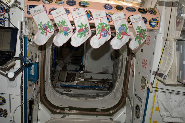 NASA image: Expedition 34 Christmas stockings at the Node 1 hatch