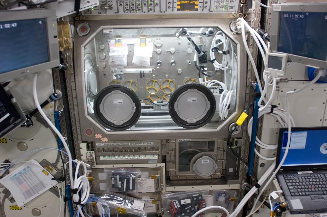 View of Command and Monitoring Panel (CMP),and Power Distribution and Conversion Box (PDC),on the Microgravity Science Glovebox (MSG) rack during Investigating the Structure of Paramagnetic Aggregates from Colloidal Emulsions 3 (InSPACE-3) Experiment,in the U.S. Laboratory. Photo was taken during Expedition 34.