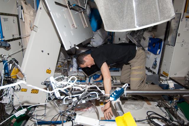 NASA image: Marshburn updates software on the WHC UPA in the Node 3