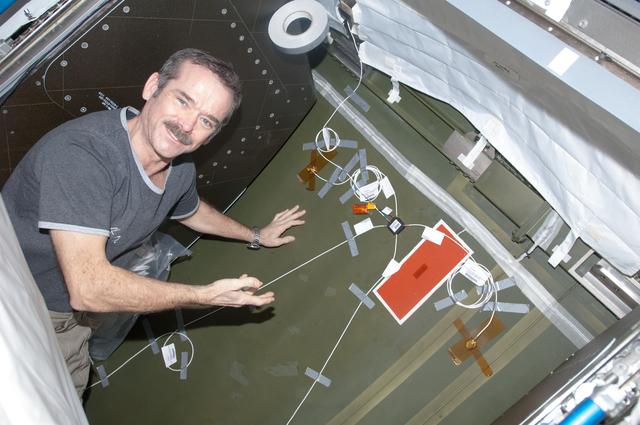NASA image: Hadfield installing UBNT Sensors in the U.S. Laboratory