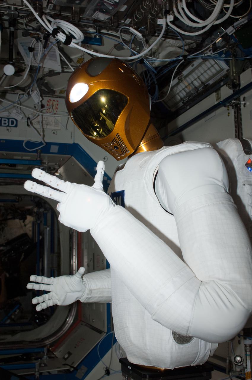 ISS034-E-039157 (1 Feb. 2013) --- Robonaut 2, the first humanoid robot in space, is pictured in this image photographed by an Expedition 34 crew member in the International Space Station’s Destiny laboratory. R2 was powered up so ground controllers could run it through a series of tests and configuration checks after a recent software upgrade.