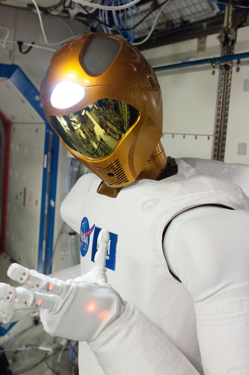 ISS034-E-039162 (1 Feb. 2013) --- Robonaut 2, the first humanoid robot in space, is pictured in this image photographed by an Expedition 34 crew member in the International Space Station’s Destiny laboratory. R2 was powered up so ground controllers could run it through a series of tests and configuration checks after a recent software upgrade.