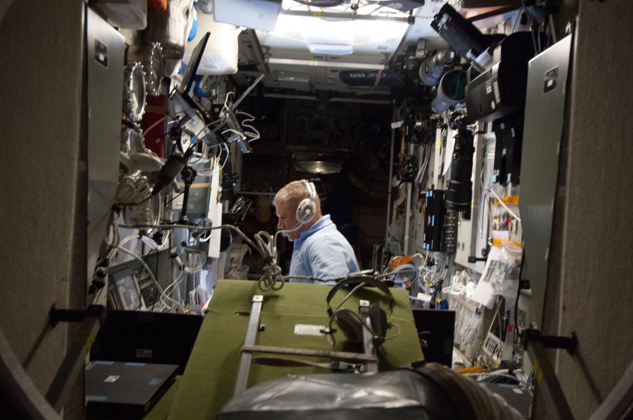 ISS034-E-045753 (11 Feb. 2013) --- Russian cosmonaut Oleg Novitskiy, Expedition 34 flight engineer, monitors data at the manual TORU docking system controls in the Zvezda Service Module of the International Space Station during approach and docking operations of the unpiloted ISS Progress 50 resupply vehicle. Progress 50 docked with the station’s Pirs docking compartment at 3:35 p.m. (EST), delivering 1,764 pounds of propellant, 110 pounds of oxygen and air, 926 pounds of water and 3,000 pounds of spare parts, experiment hardware and logistics equipment --- 2.9 tons of supplies in all. The space freighter launched from the Baikonur Cosmodrome in Kazakhstan at 9:41 a.m. (8:41 p.m. Kazakhstan time) on an accelerated, four-orbit journey to rendezvous with the station.