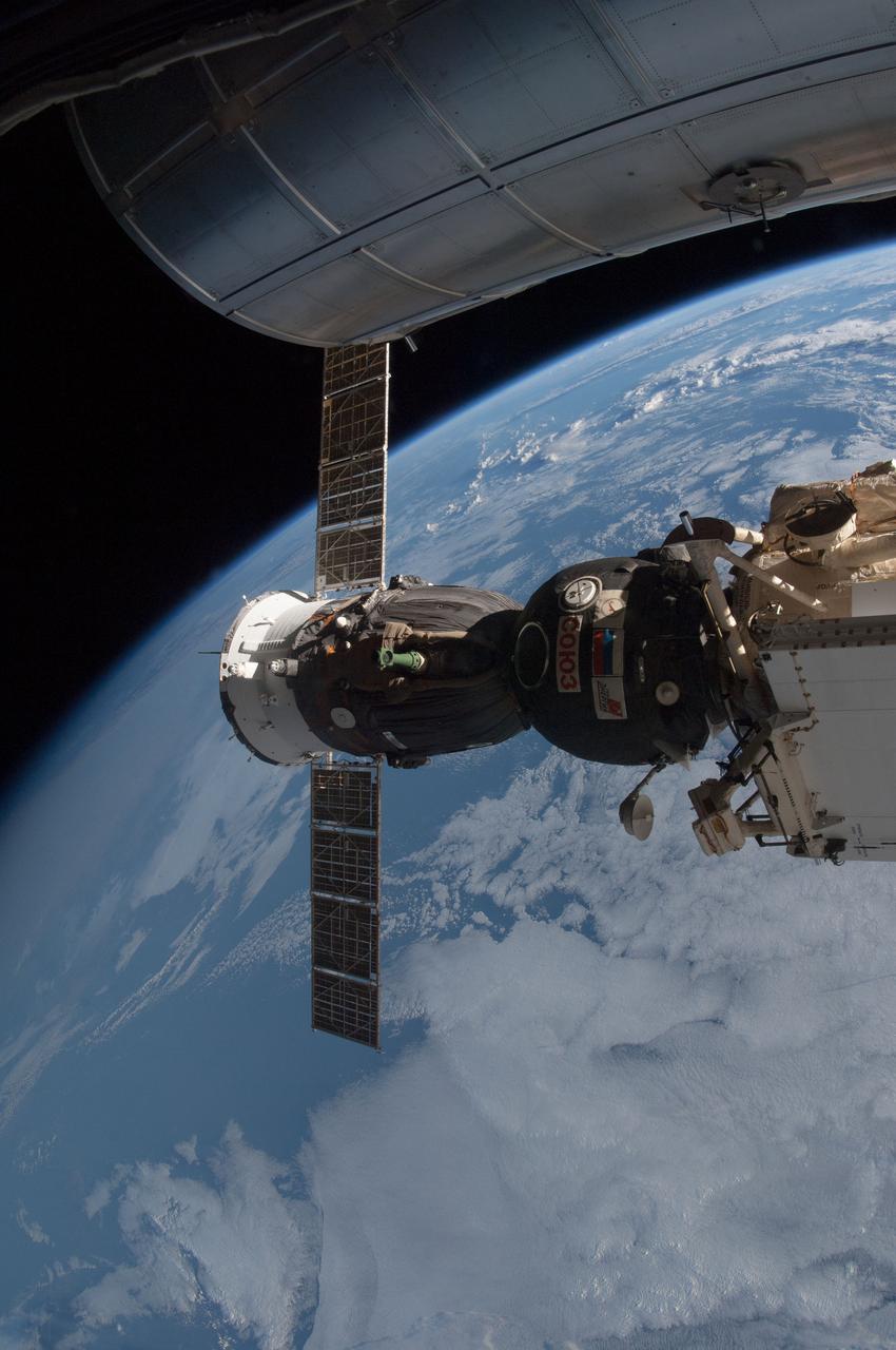 ISS034-E-045759 (11 Feb. 2013) --- Clouds form the backdrop for this scene photographed by one of the Expedition 34 crew members aboard the International Space Station, with the Soyuz 33 (TMA-07M) docked to the Rassvet Mini-Research Module 1 (MRM1). The Permanent Multipurpose Module (PMM) is visible at top.