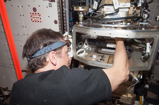 NASA image: Marshburn configures FIR/LMM ACE hardware, in the U.S. Laboratory