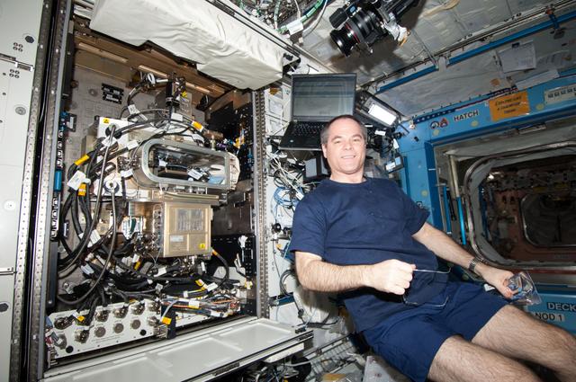 NASA image: Ford poses at the FIR/LMM/ACE in the U.S. Laboratory