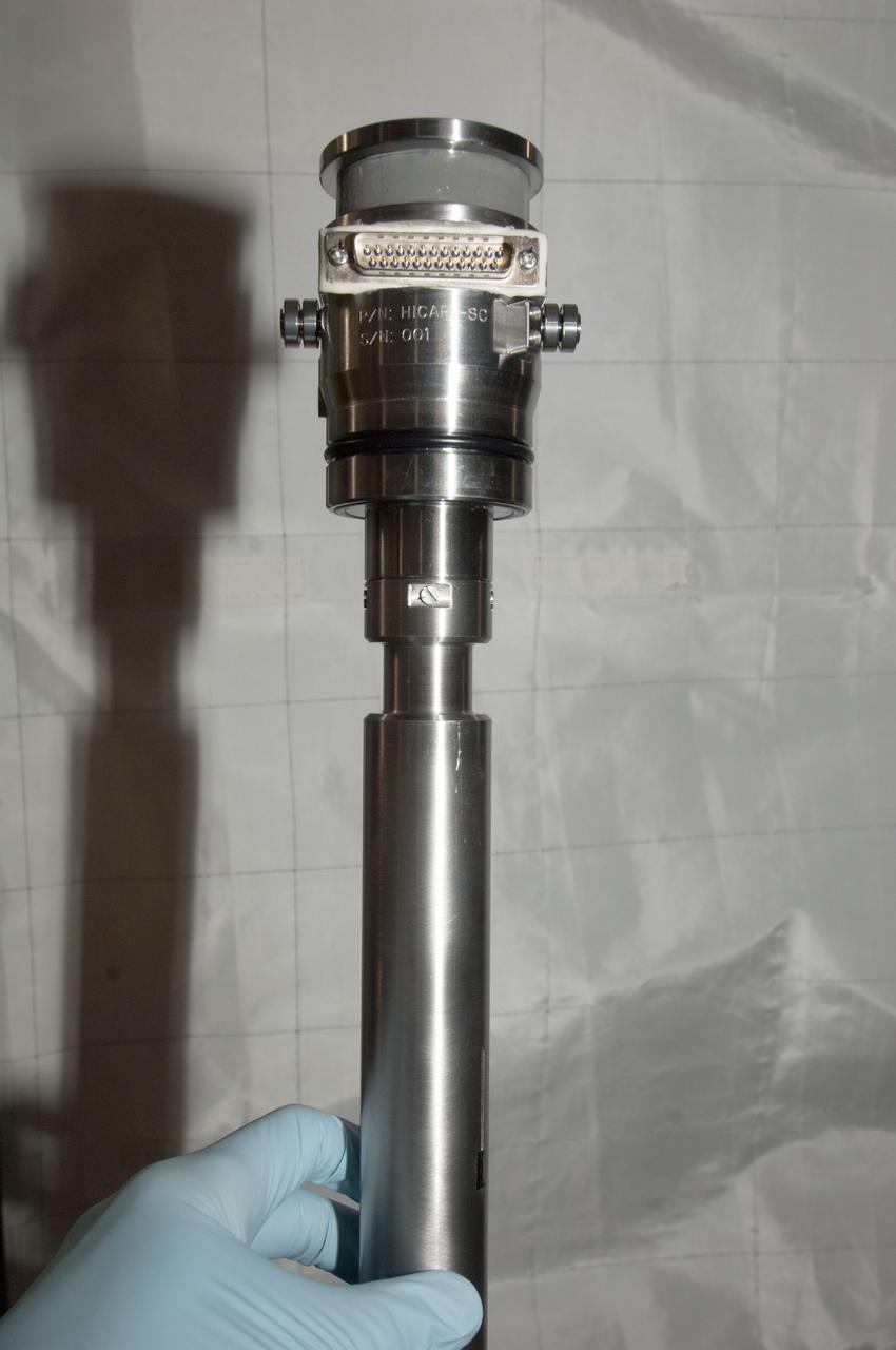 iss035e006283 (3/18/2013) --- Photo documentation of the Hicari (Growth of Homogeneous Silicon-Germanium [SiGe] Crystals in Microgravity by the Traveling Liquidous Zone [TLZ] Method) Experiment Sample Cartridge (SC) following its removal from the Kobairo Rack during Expedition 35. The materials science investigation Growth of Homogeneous SiGe Crystals in Microgravity by the TLZ Method (Hicari) aims to verify the crystal-growth by Travelling Liquidous Zone method, and to produce high-quality crystals of Silicon-Germanium (SiGe) semiconductor using the Japanese Experiment Module-Gradient Heating Furnace (JEM-GHF).