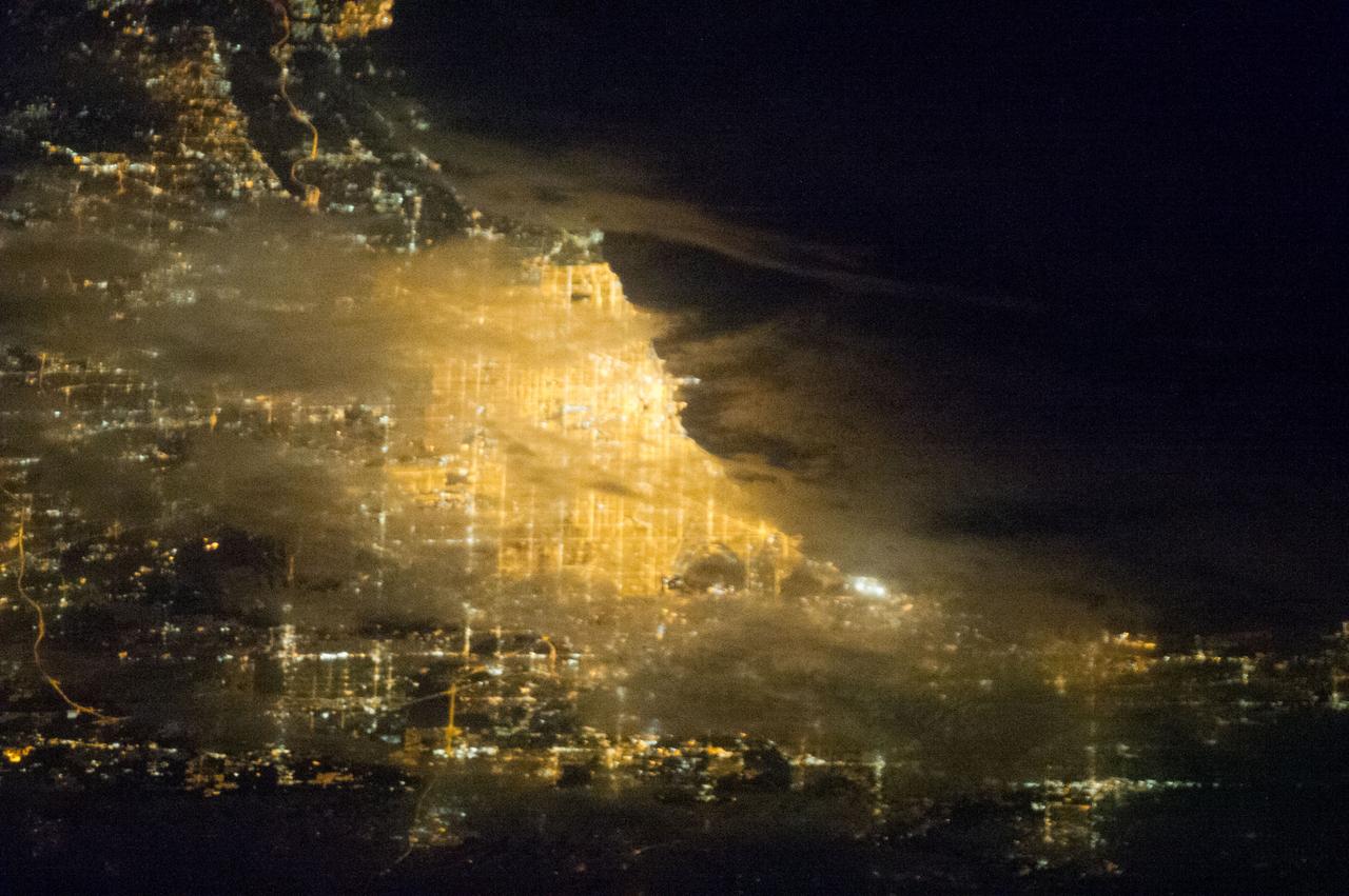 Earth observation taken by the Expedition 35 crew aboard the ISS. View of city lights at night.
