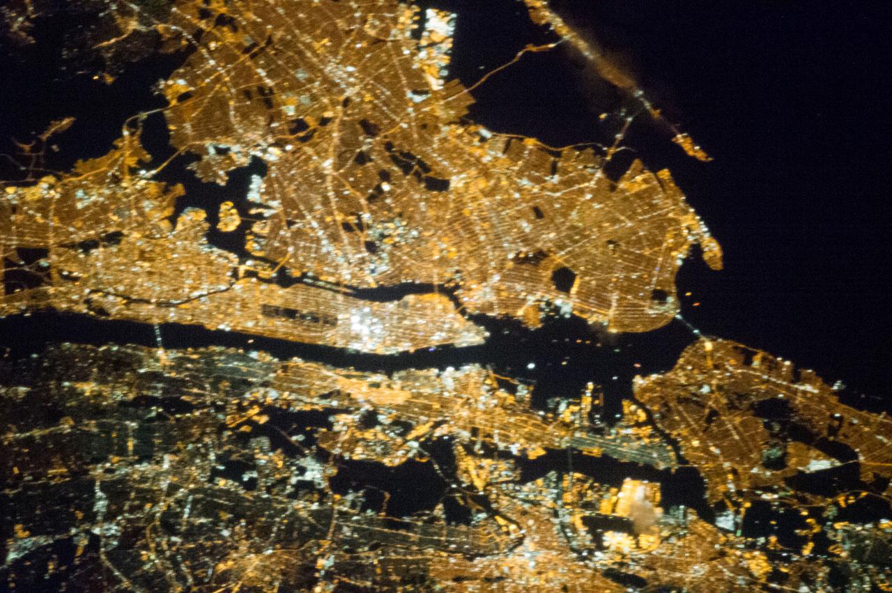 ISS035-E-008051 (23 March 2013) --- One of the Expedition 35 crew members aboard the Earth-orbiting International Space Station exposed this 400 millimeter night image of the greater New York City metropolitan area on March 23. For orientation purposes, note that Manhattan runs horizontal through the frame from left to the midpoint. Central Park is just a little to the left of frame center.
