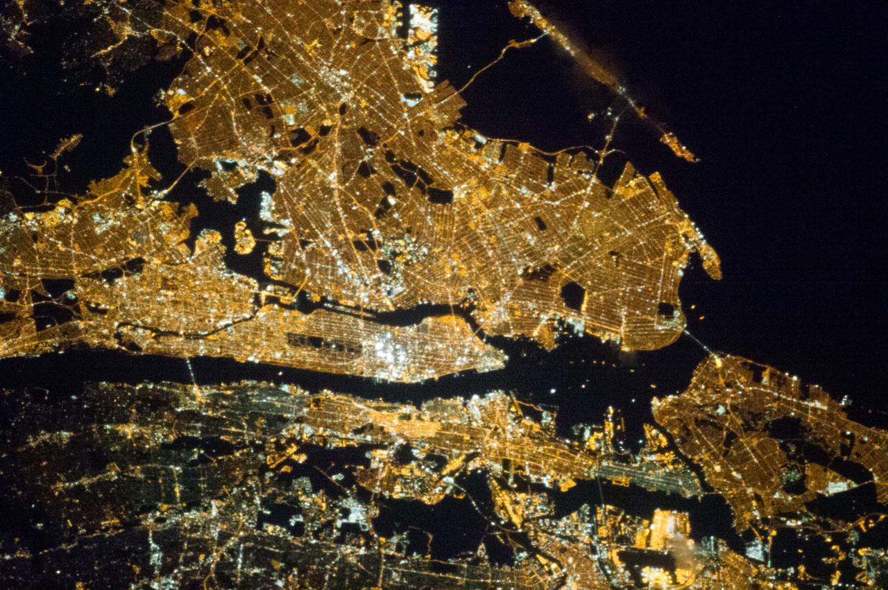 ISS035-E-008056 (23 March 2013) --- One of the Expedition 35 crew members aboard the Earth-orbiting International Space Station exposed this 400 millimeter night image of the greater New York City metropolitan area on March 23. For orientation purposes, note that Manhattan runs horizontal through the frame from left to the midpoint. Central Park is just a little to the left of frame center.