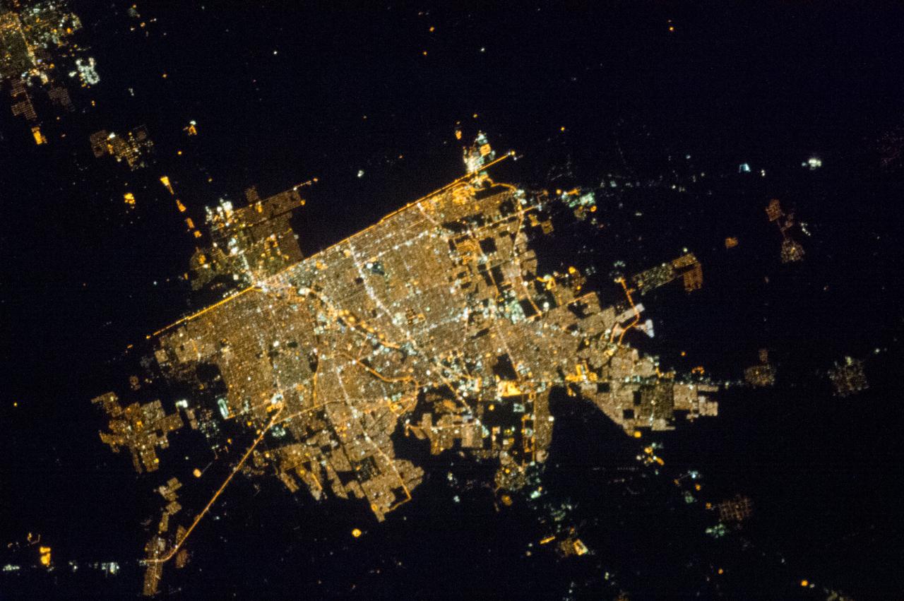 Earth observation taken by the Expedition 35 crew aboard the ISS. View of city lights at night.