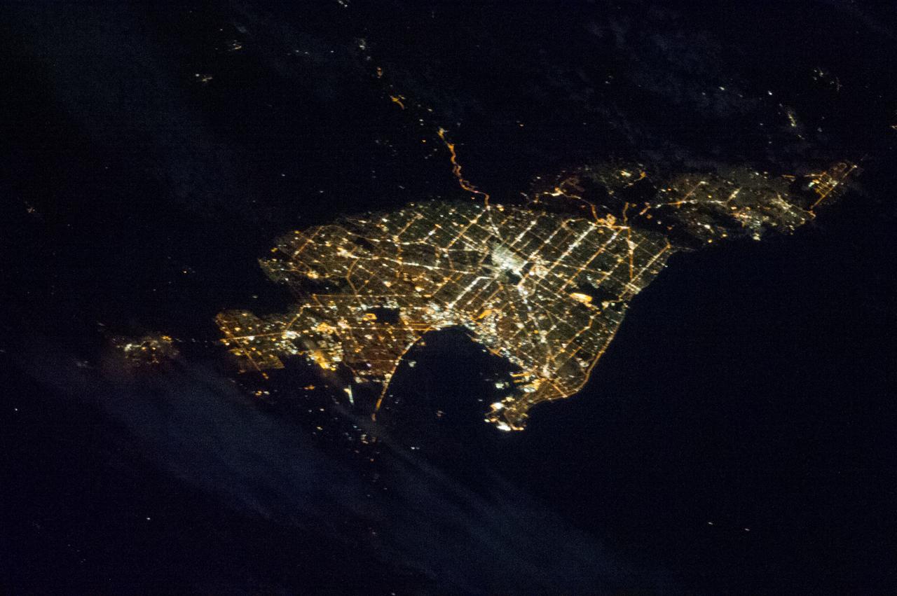 Earth observation taken by the Expedition 35 crew aboard the ISS. View of city lights at night.