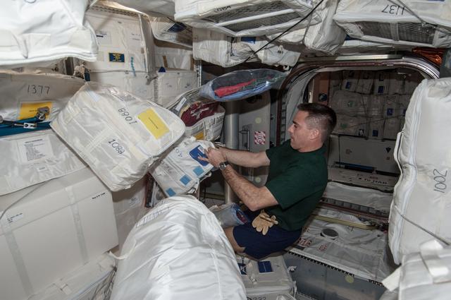 NASA image: Cassidy works with Stowage in PMM