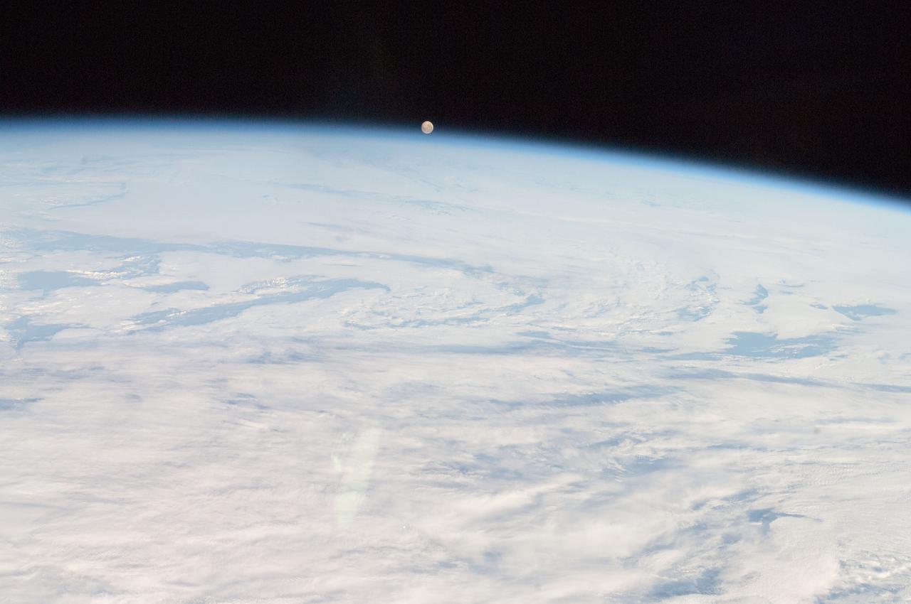 Lunar observation taken by the Expedition 35 crew aboard the ISS. An Earth limb is in view.