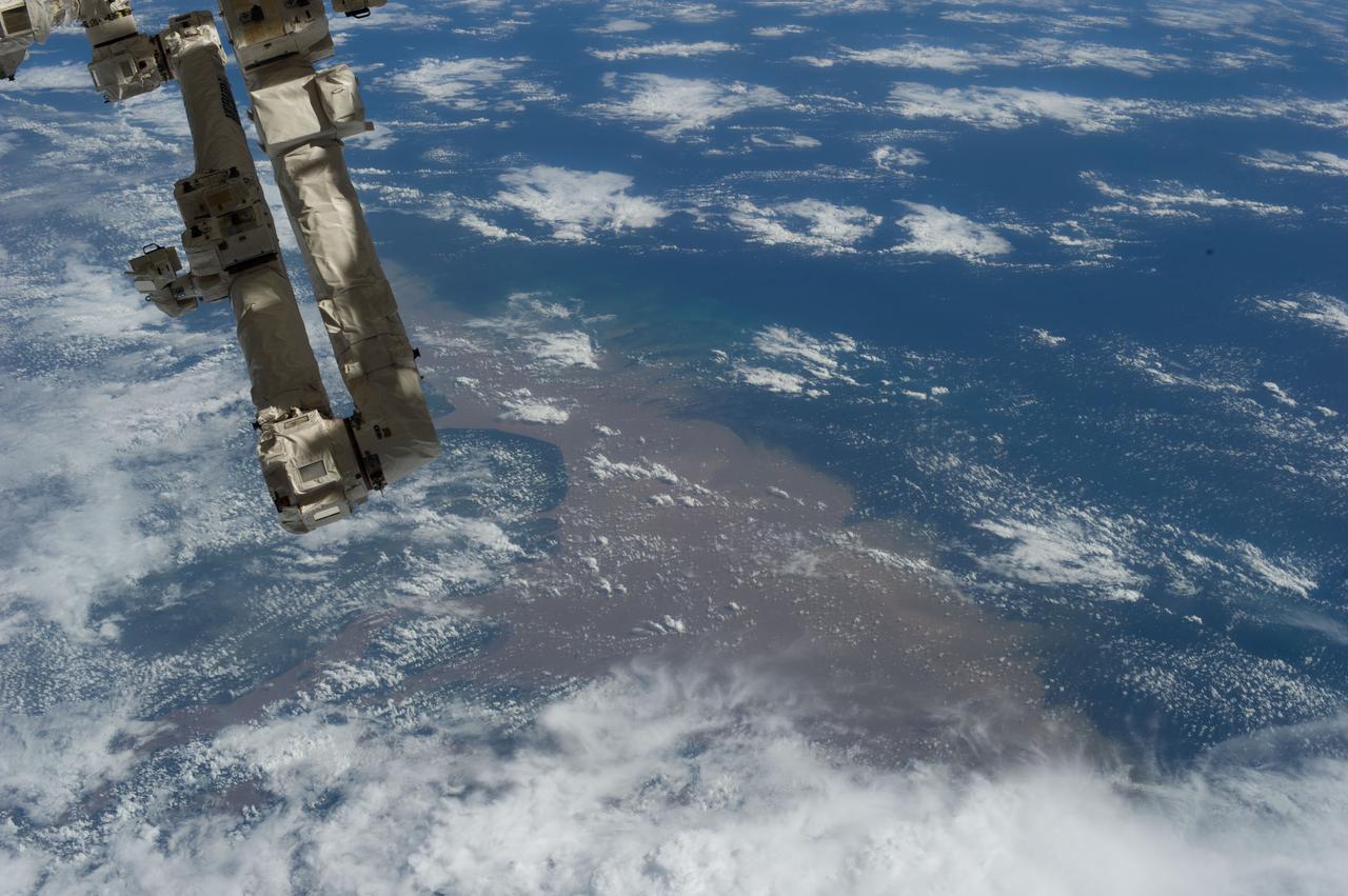 Earth observation taken by the Expedition 35 crew aboard the ISS. A portion of the Canadarm2 Space Station Remote Manipulator System (SSRMS) is in view.