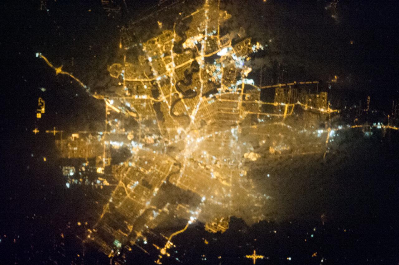 Earth observation taken by the Expedition 35 crew aboard the ISS. Night view of city lights.