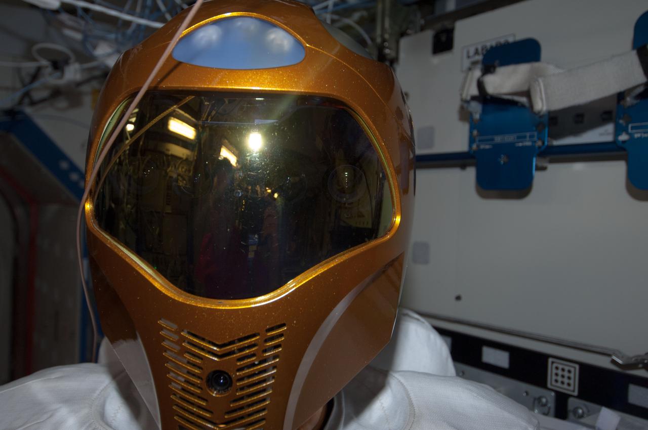 ISS035-E-016453 (9 April 2013) ---  R-2 is busy in U.S. lab Destiny aboard the Earth-orbiting International Space Station during tele-operation (by ground controllers) to mimic movement of a crew member.