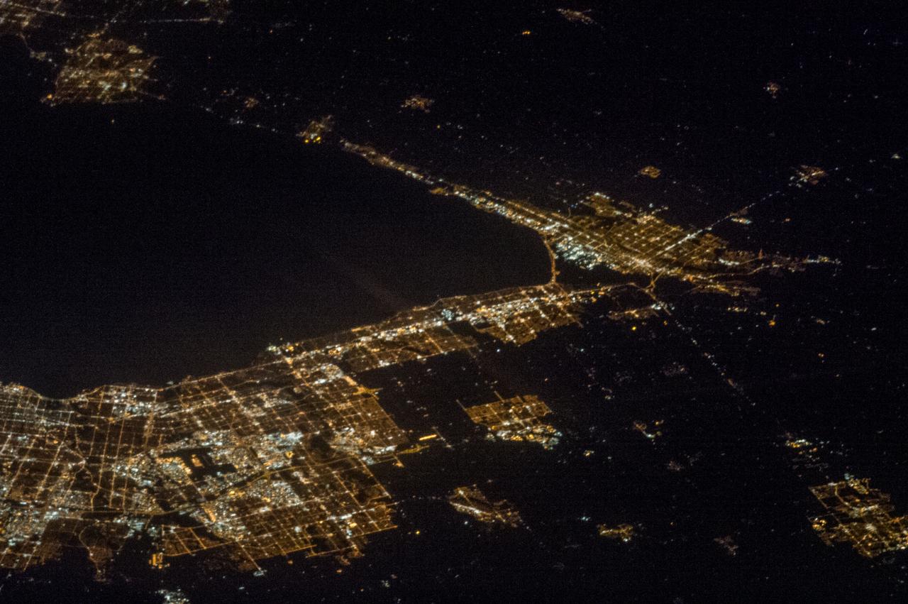 Earth observation taken by the Expedition 35 crew aboard the ISS. Night view of city lights.