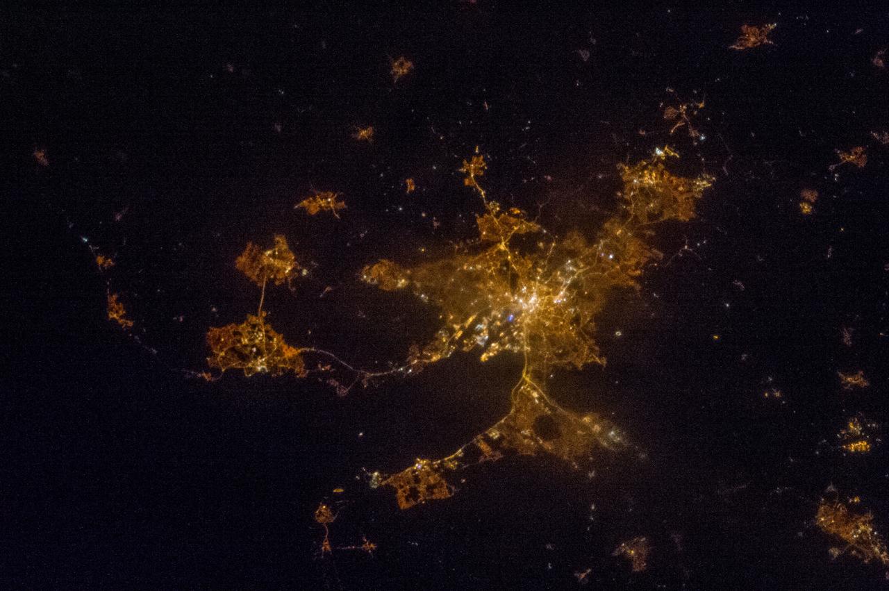 Earth observation taken by the Expedition 35 crew aboard the ISS. Night view of city lights.