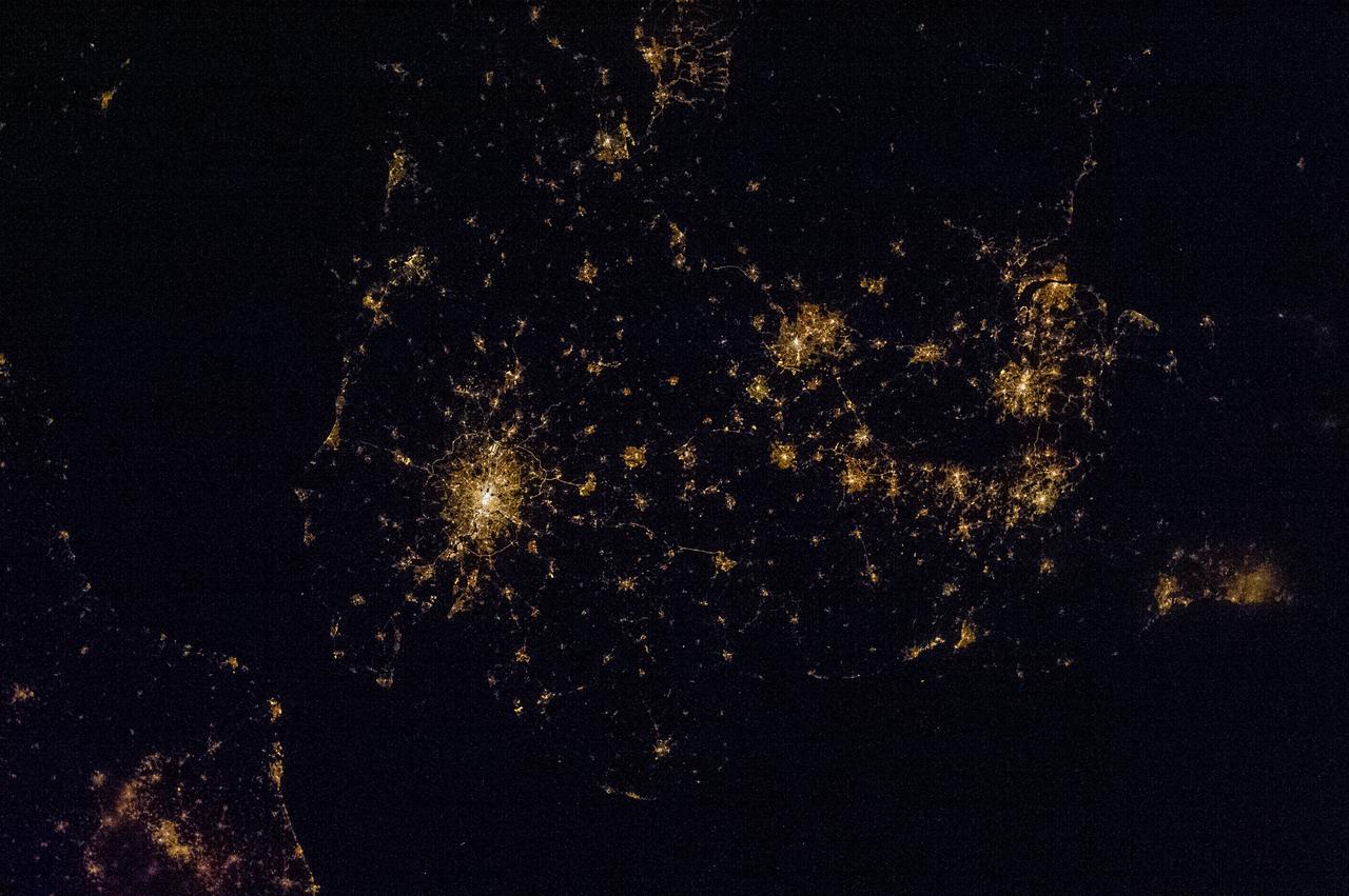 Earth observation taken by the Expedition 35 crew aboard the ISS. Night view of city lights.