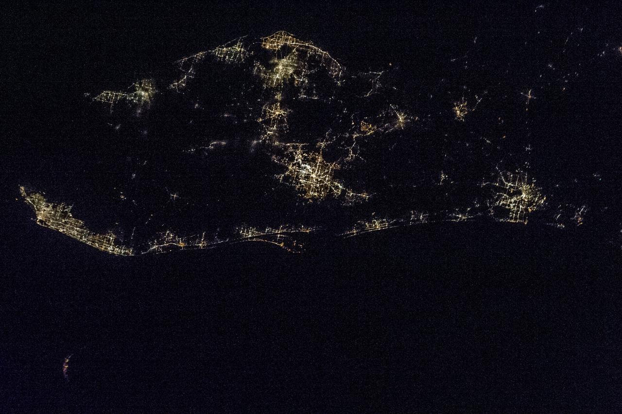 Earth observation taken by the Expedition 35 crew aboard the ISS. Night view of city lights.
