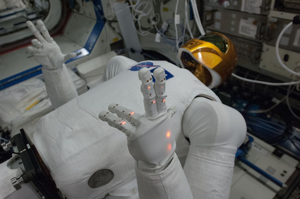 Documentation of Robonaut 2 (R2) in the Destiny U.S. Laboratory during the first use of the Robonaut Tele-operation System. Robonaut is a dexterous humanoid robot designed with the versatility and dexterity to manipulate hardware, work in high risk environments, and respond safely to unexpected obstacles. Image was released by astronaut on Twitter.