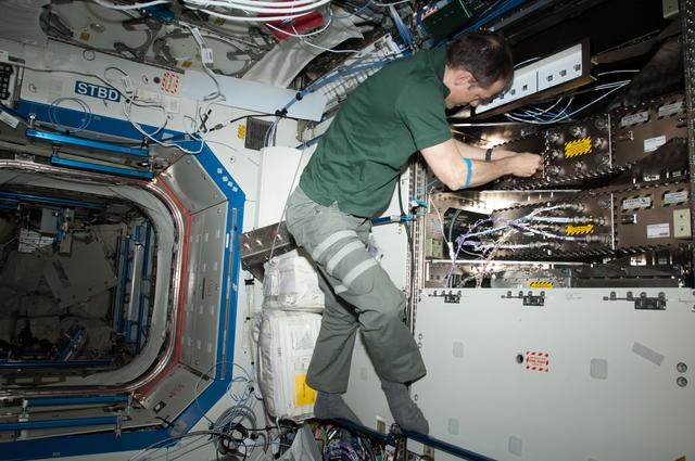 NASA image: Marshburn during HRCS Ku Comm Unit 1 Installation