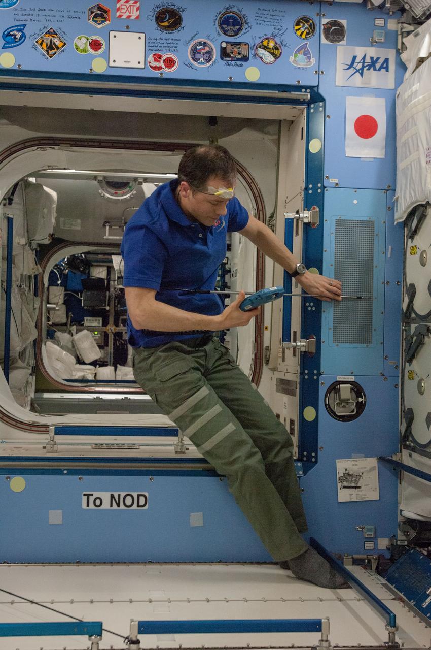 ISS035-E-020060 (15 April 2013) --- NASA astronaut Tom Marshburn works on the Inter Module Ventilation (IMV) Flow Measurement in Kibo Japanese Experiment Module (JEM)aboard the Earth-orbiting International Space Station. Expedition 35 Commander Chris Hadfield, an astronaut with the Canadian Space Agency, and Marshburn set up the velocicalc hardware and measured the IMV flow coming from the JEM Pressurized Module (JPM) IMV overhead aft inlet, starboard aft inlet, and starboard forward outlet. The measurements are part of routine preventative maintenance to ensure quality airflow in the modules.