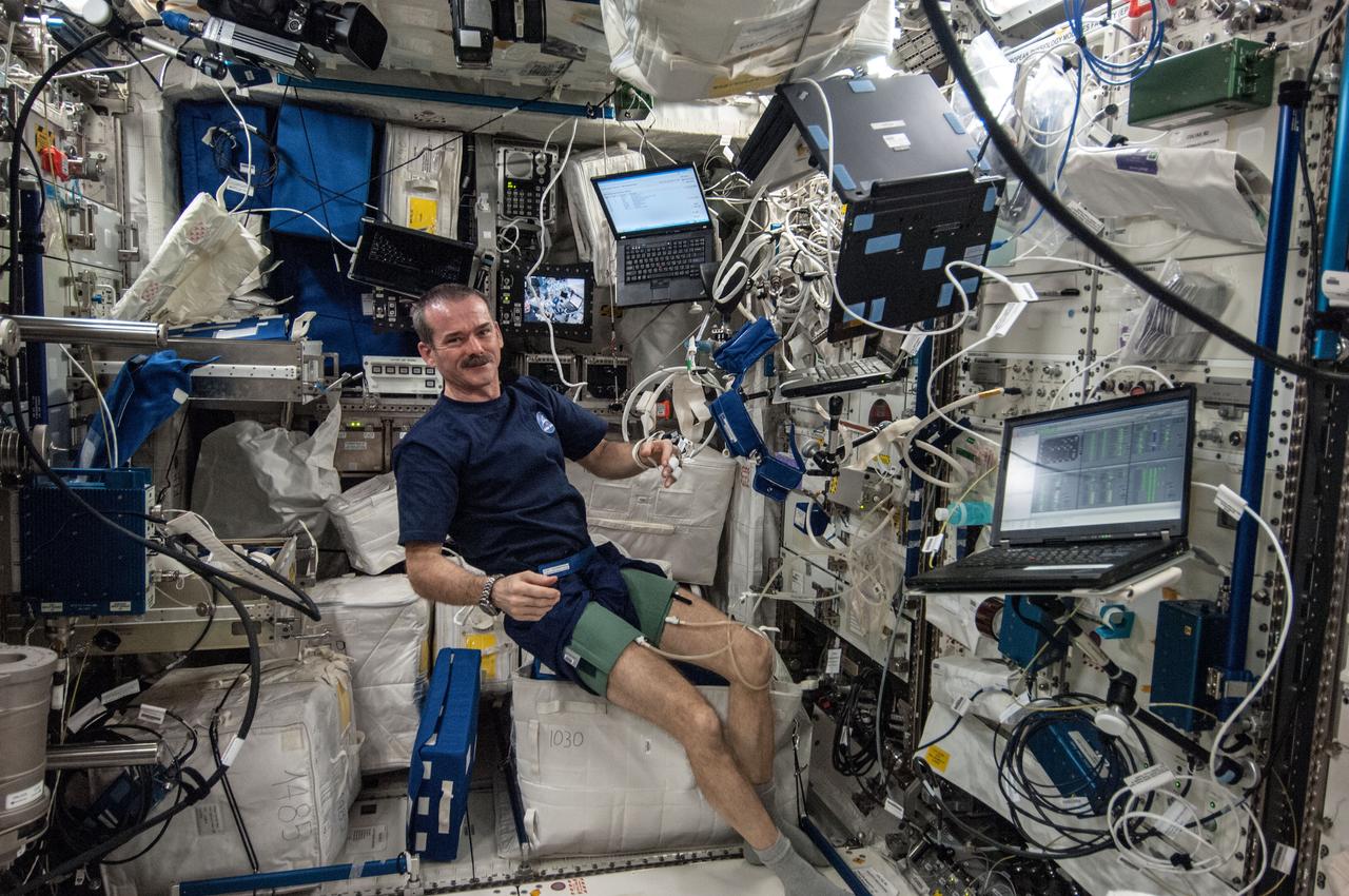 ISS035-E-022356 (17 April 2013) --- In support of the Blood Pressure Regulation Experiment (BP Reg), Expedition 35 Commander Chris Hadfield of the Canadian Space Agency is pictured after having set up the Human Research Facility (HRF) PFS (Pulmonary Function System) and the European Physiology Module (EPM) Cardiolab (CDL) Leg/Arm Cuff System (LACS) and conducting the first ever session of this experiment.  The test, which will be repeated using other crew members as well, will help to identify the astronauts who could benefit from countermeasures before returning to Earth. Thus, this method has great potential for astronaut health monitoring during future long-term space flights and it also has important implications for testing of individuals on Earth, especially the elderly, who are at risk for fainting. The research will also allow demonstrating the feasibility of obtaining a set of indicators of overall cardiovascular regulation from the non-invasive measurement of continuous blood pressure.