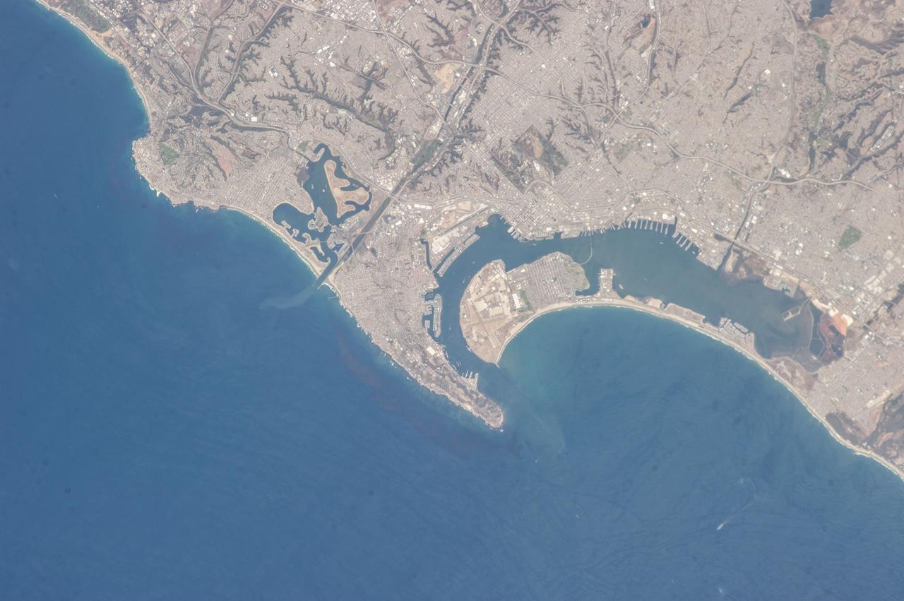 ISS035-E-027264 (22 April 2013) ---  One of the Expedition 35 crew members aboard the Earth-orbiting International Space Station took this vertical image covering most of San Diego County,  the most southwestern county in the 48 contiguous United States. Its county seat and largest city is San Diego. According to the 2010 U.S. Census, San Diego County had a population of 3,095,313 people, making it the second most populous county in California, with the first being Los Angeles County. The United States Naval Air Station at San Diego is visible, as are the nearby United States Naval Reservation and the Coronado Amphibious Base. The United States - Mexico border is just out  of view at the right edge of the frame.