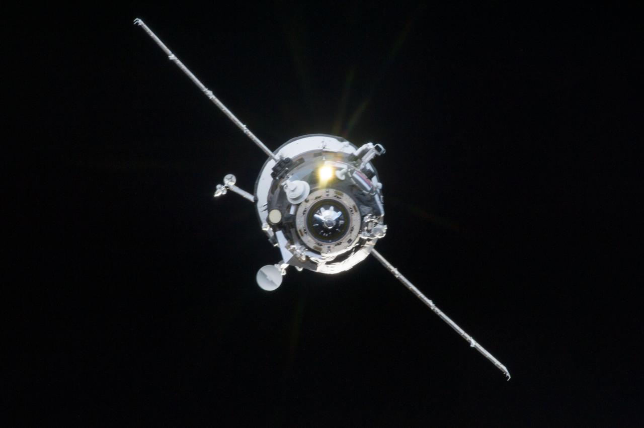 ISS035-E-029908 (26 April 2013) --- Surrounded by the blackness of space, the Russian Progress 51 cargo craft approaches the Zvezda service module (out of frame)of the International Space Station on April 26, 2013. The unmanned cargo vehicle minutes later successfully docked with the orbital outpost.