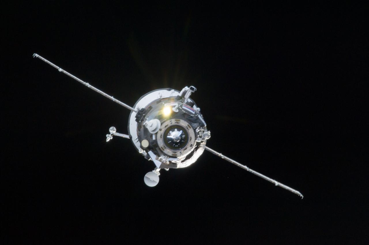ISS035-E-029910 (26 April 2013) --- Surrounded by the blackness of space, the Russian Progress 51 cargo craft approaches the Zvezda service module (out of frame) of the International Space Station on April 26, 2013. The unmanned cargo vehicle minutes later successfully docked with the orbital outpost.